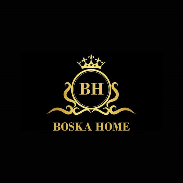 Boska Home logo i sort og gull med en elegant krone og initialene BH, symboliserer luksus og eksklusivitet i hjemmedekor og interiørprodukter.